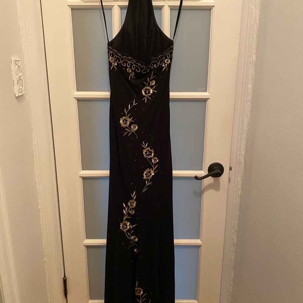 Formal gown. halter dress. black with gold detail